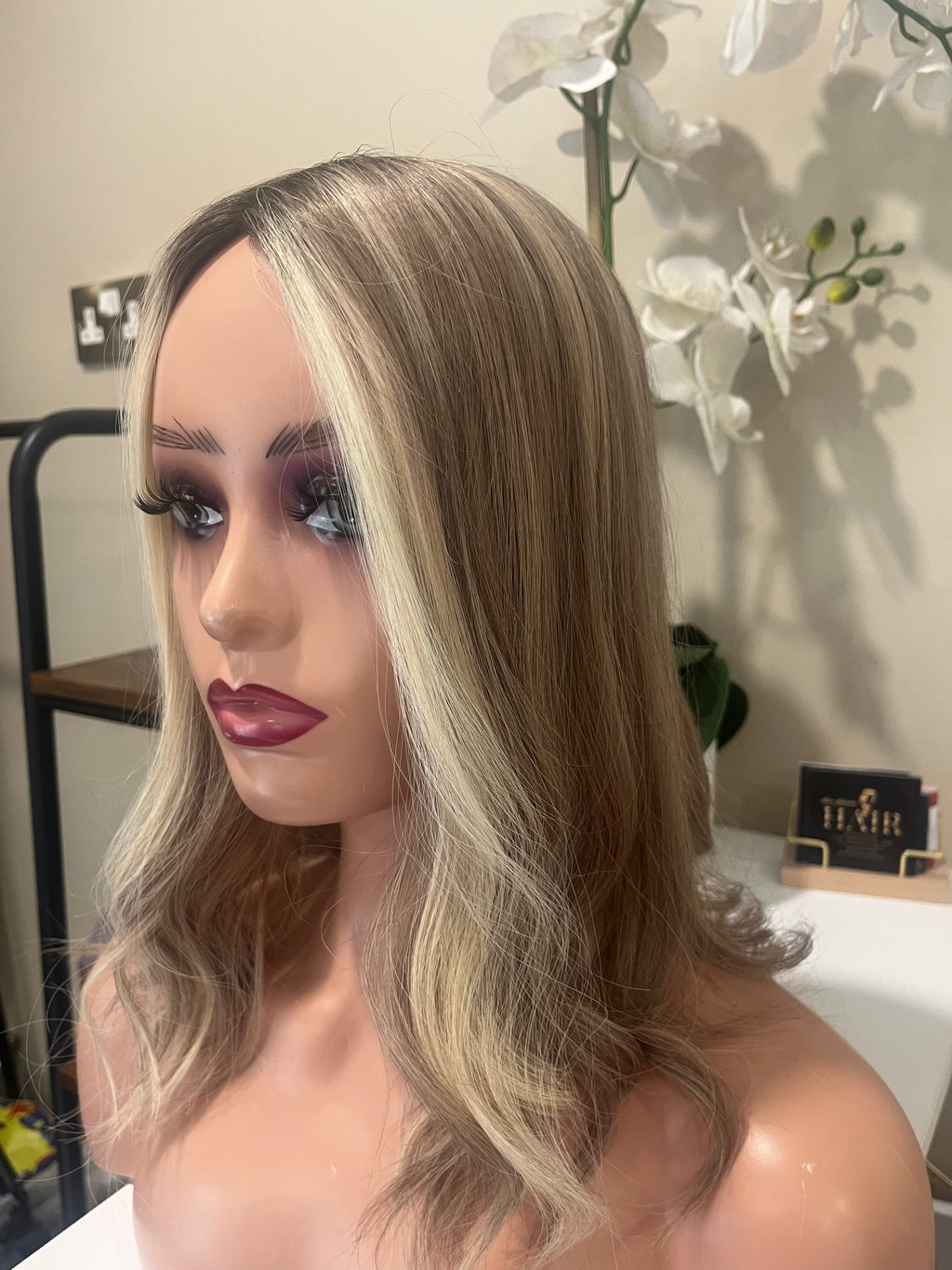The AJ Luxe Human Hair Enhancer Expresso Rooted Blonde lights 14 inches